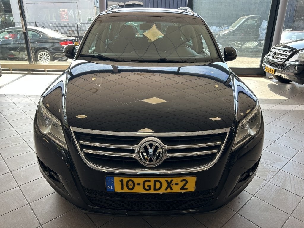 Volkswagen Tiguan 1.4 TSI Sport&St. 4M Achteruit rij Cam NW, Auto's, Gebruikt, 4 cilinders, Zwart, Origineel Nederlands