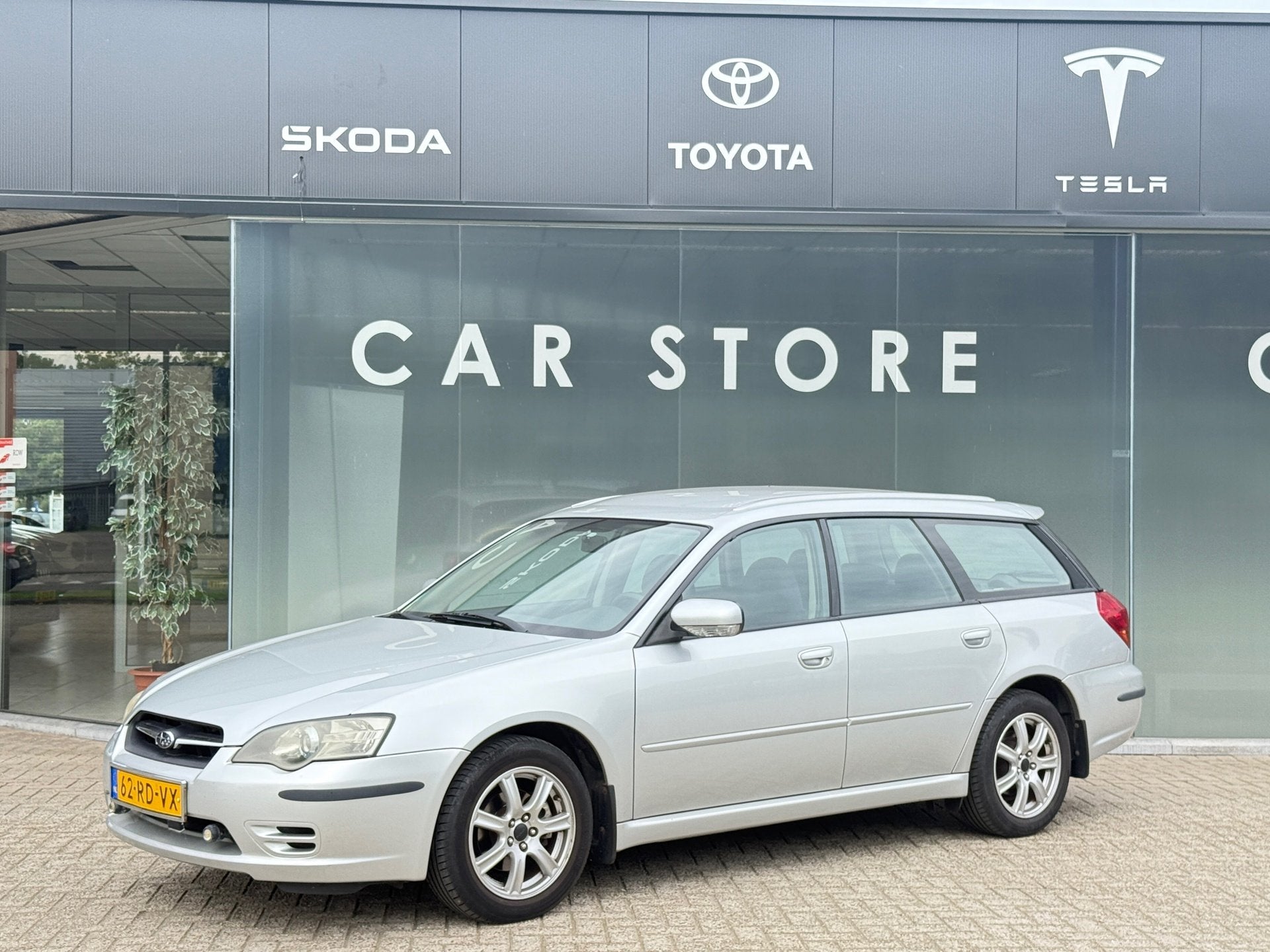 Subaru Legacy Touring Wagon 2.0i Dealer Onderhouden TOP STAA, Auto's, Dealer onderhouden, Gebruikt, Zwart, 4 cilinders