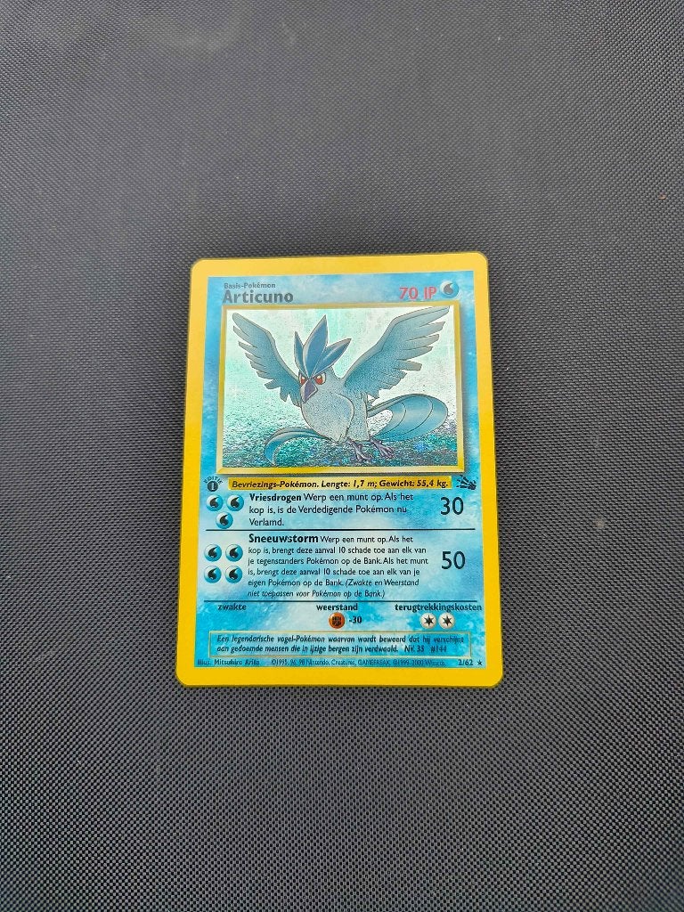 Pokemon Articuno 1st edition fossil Nederlands, Hobby en Vrije tijd, Verzamelkaartspellen | Pokémon, Ophalen of Verzenden, Zo goed als nieuw