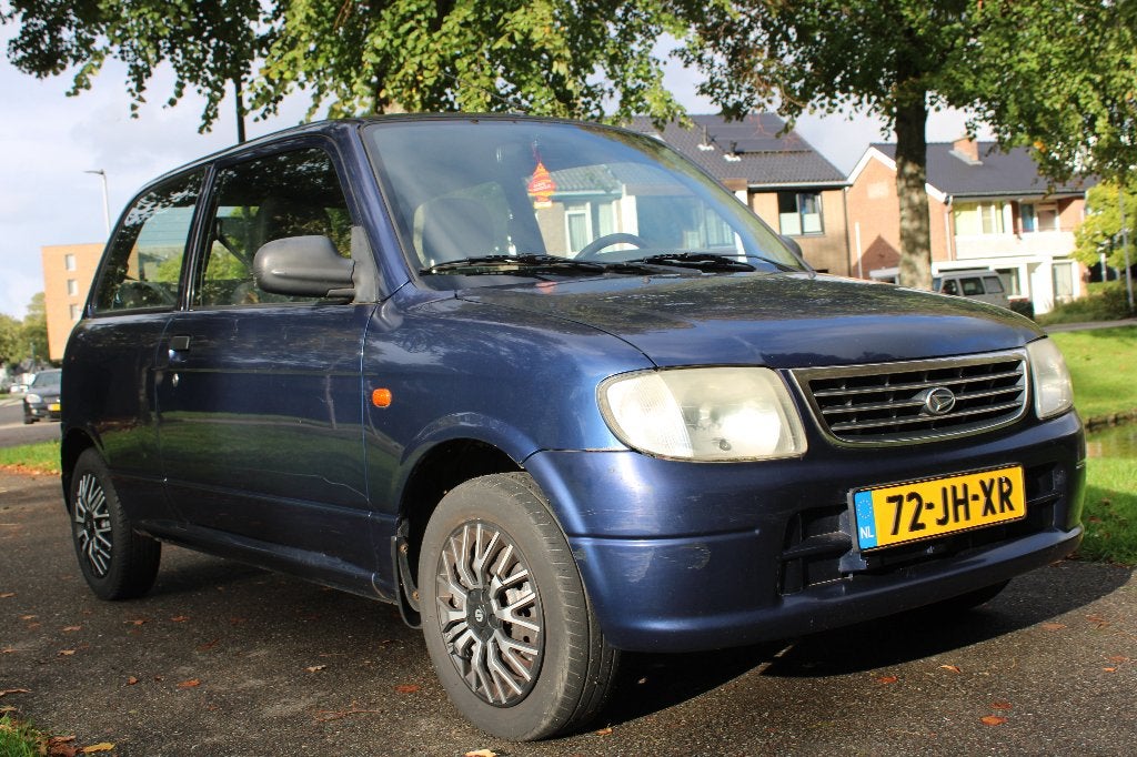 Daihatsu Cuore 1.0 AUTOMAAT 2002 Blauw, Auto's, 600 kg, Cuore, Origineel Nederlands, Grijs