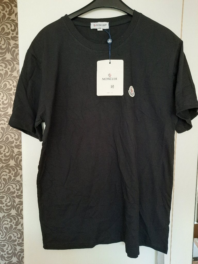 Moncler T-shirt in het zwart maat 2 xl, Ophalen of Verzenden, Zo goed als nieuw, Maat 48/50 (M), Zwart