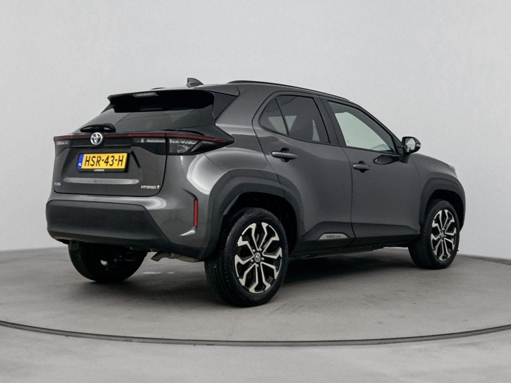 Toyota Yaris Cross 1.5 Hybrid Dynamic | Draadloos Apple Carp, Auto's, 12 maanden, Stof, Gebruikt, 116 pk