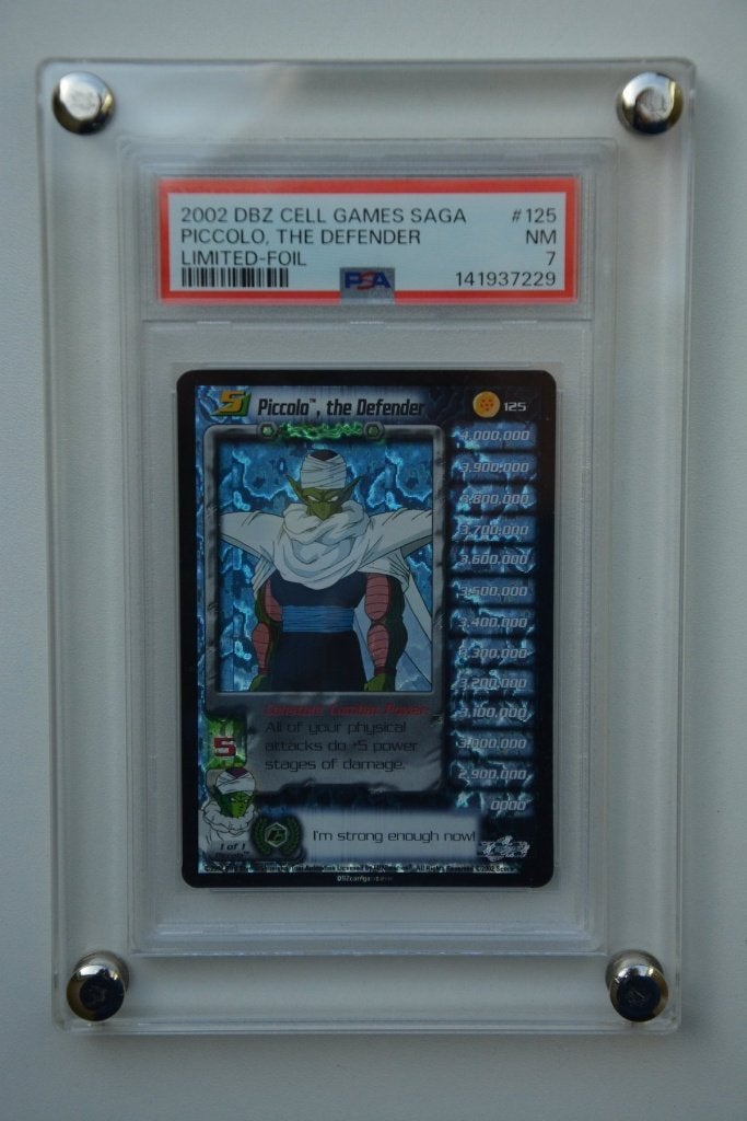 Dragonball Z Score Piccolo the Defender Ultra Rare PSA 7, Ophalen of Verzenden, Gebruikt, Losse kaart, Foil