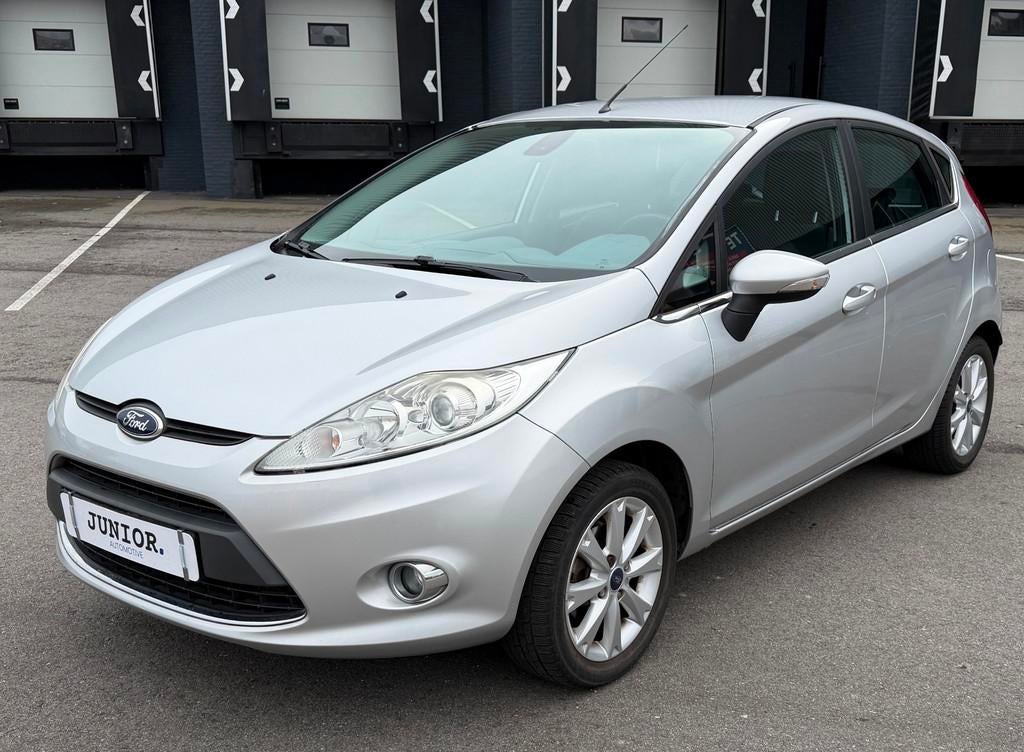 Ford Fiesta 1.25 Ghia CRUISE/CLIMA/LAGEKM/XENON/LMV/PDC, Auto's, Ford, Voorwielaandrijving, Stof, 82 pk, Origineel Nederlands