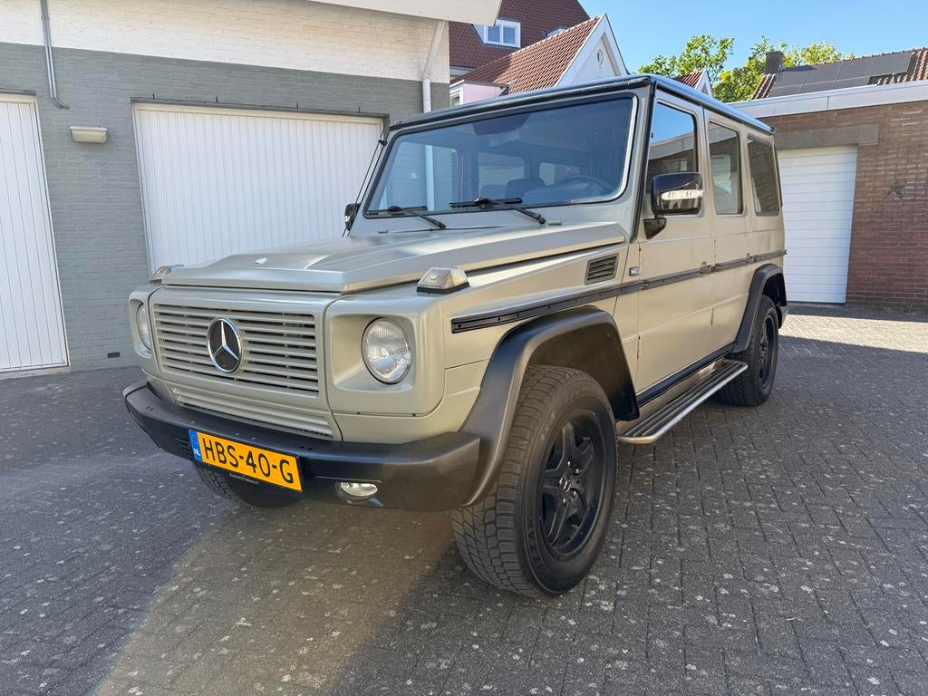 Mercedes G klasse 280GE w460 5-bak 9 zitter 4x4 dubbele sper, Auto's, Zwart, Leder en Stof, Handgeschakeld, Particulier