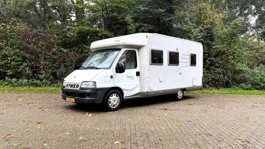 Hymer T655 (2003) – Goed onderhouden & nieuwe APK, Caravans en Kamperen, Integraal, Elektrische ramen, 6 tot 7 meter, Particulier