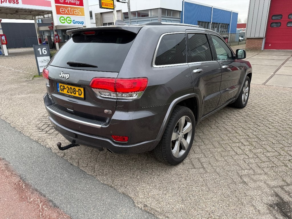Jeep Grand Cherokee 3.0 CRD V6 184KW AUT 2014 Grijs, Auto's, Jeep, Euro 5, 2987 cc, Leder, Bedrijf