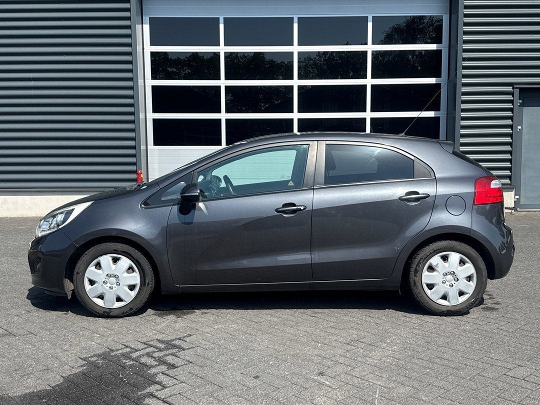 Kia Rio 1.2 CVVT Super Pack | airco | cruise control | PDC, Euro 5, Gebruikt, 4 cilinders, Origineel Nederlands