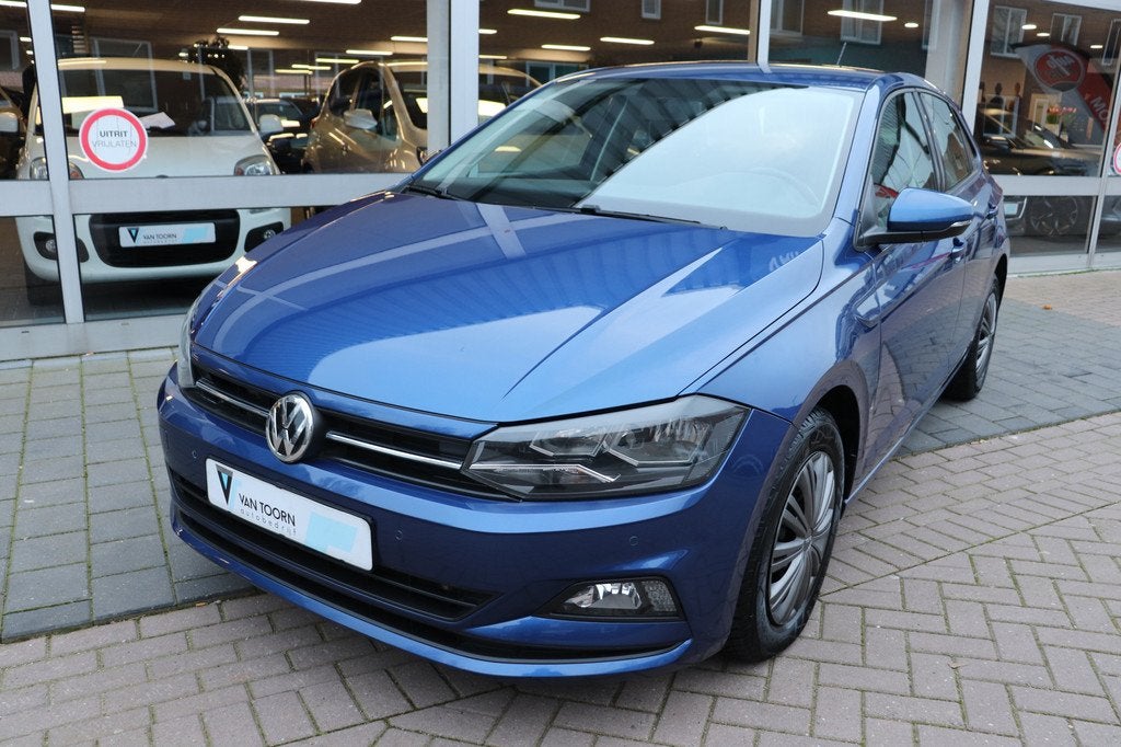 Volkswagen Polo 1.0 TSI Comfortline. Navigatie, Nederlandse, Stof, Gebruikt, Blauw, 49 €/maand