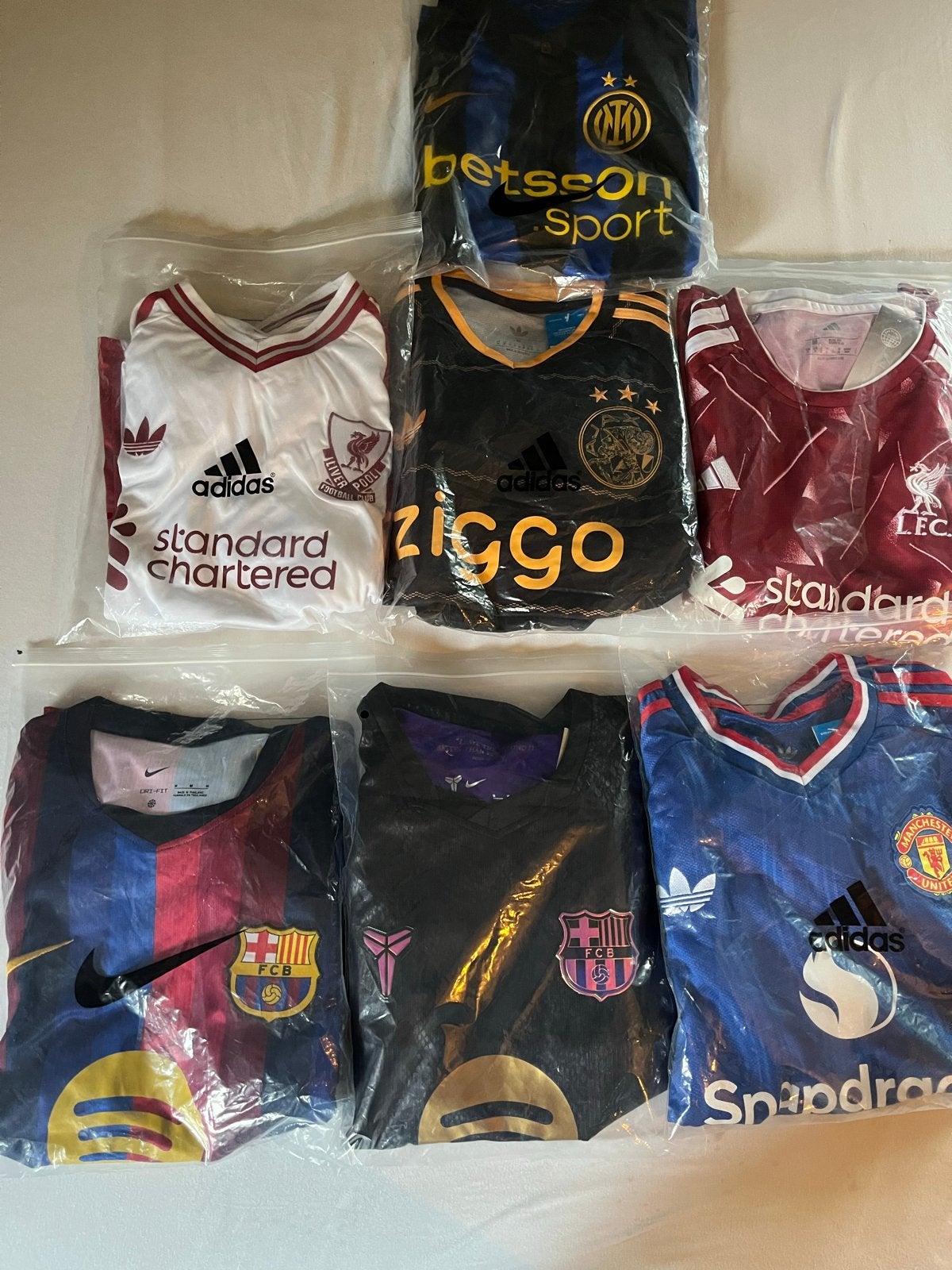 7 Voetbalpakjes - Diverse Clubs, Maat M, Ophalen of Verzenden, Nieuw, Set