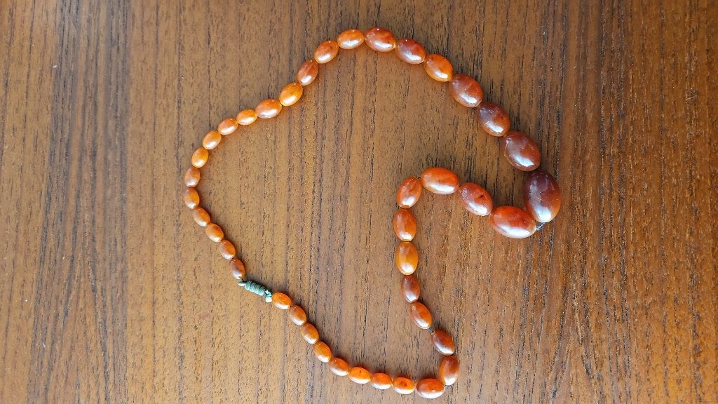 Ketting Bakeliet 43 gram antiek, Ophalen, Gebruikt, Oranje, Kunststof