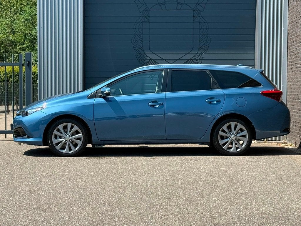 Toyota Auris Touring Sports 1.8 Hybrid Business Pro Automaat, Auto's, Toyota, Gebruikt, Euro 6, Blauw, Automatische klimaatregeling