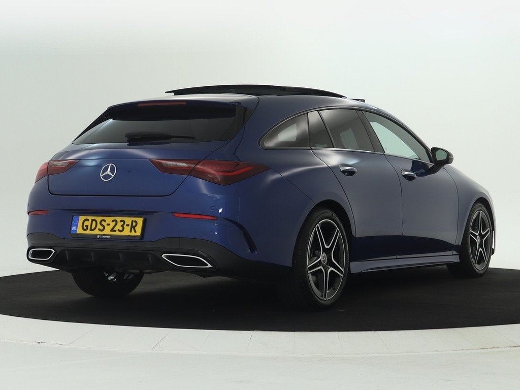 Mercedes-Benz CLA-Klasse Shooting Brake 180 AMG Line | Night, Auto's, Mercedes-Benz, 136 pk, Gebruikt, 4 cilinders, Blauw