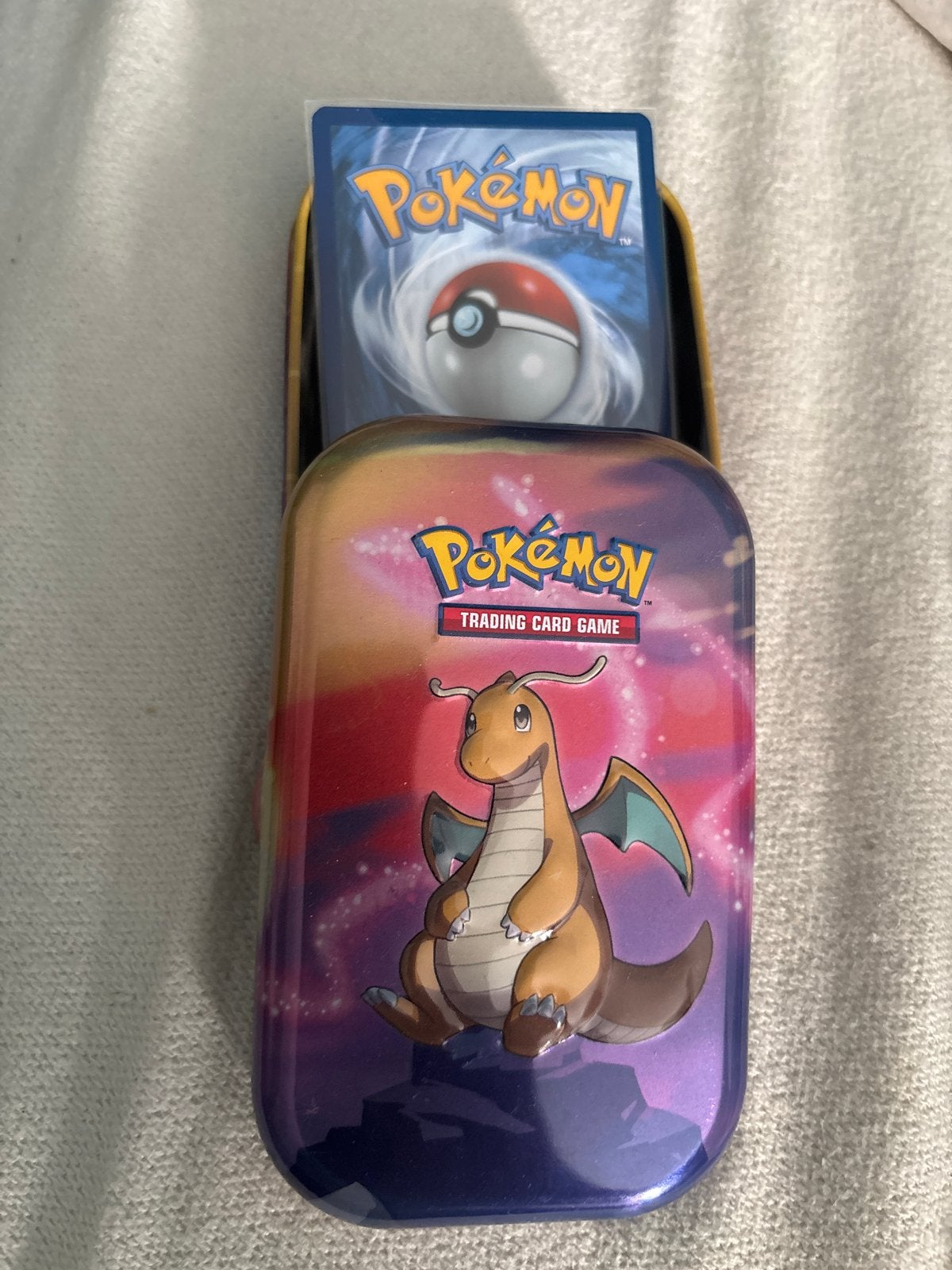 Pokemon Dragonite Tin met kaarten, Ophalen of Verzenden, Zo goed als nieuw, Meerdere kaarten, Foil