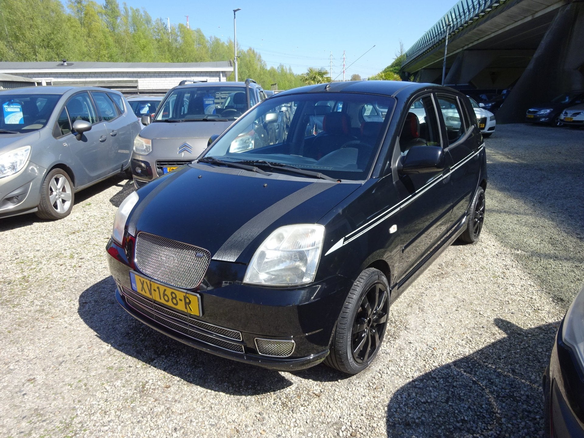 Kia Picanto 1.1 LXE, Airco, Sportuitvoering., Auto's, Gebruikt, Zwart, 4 cilinders, 400 kg