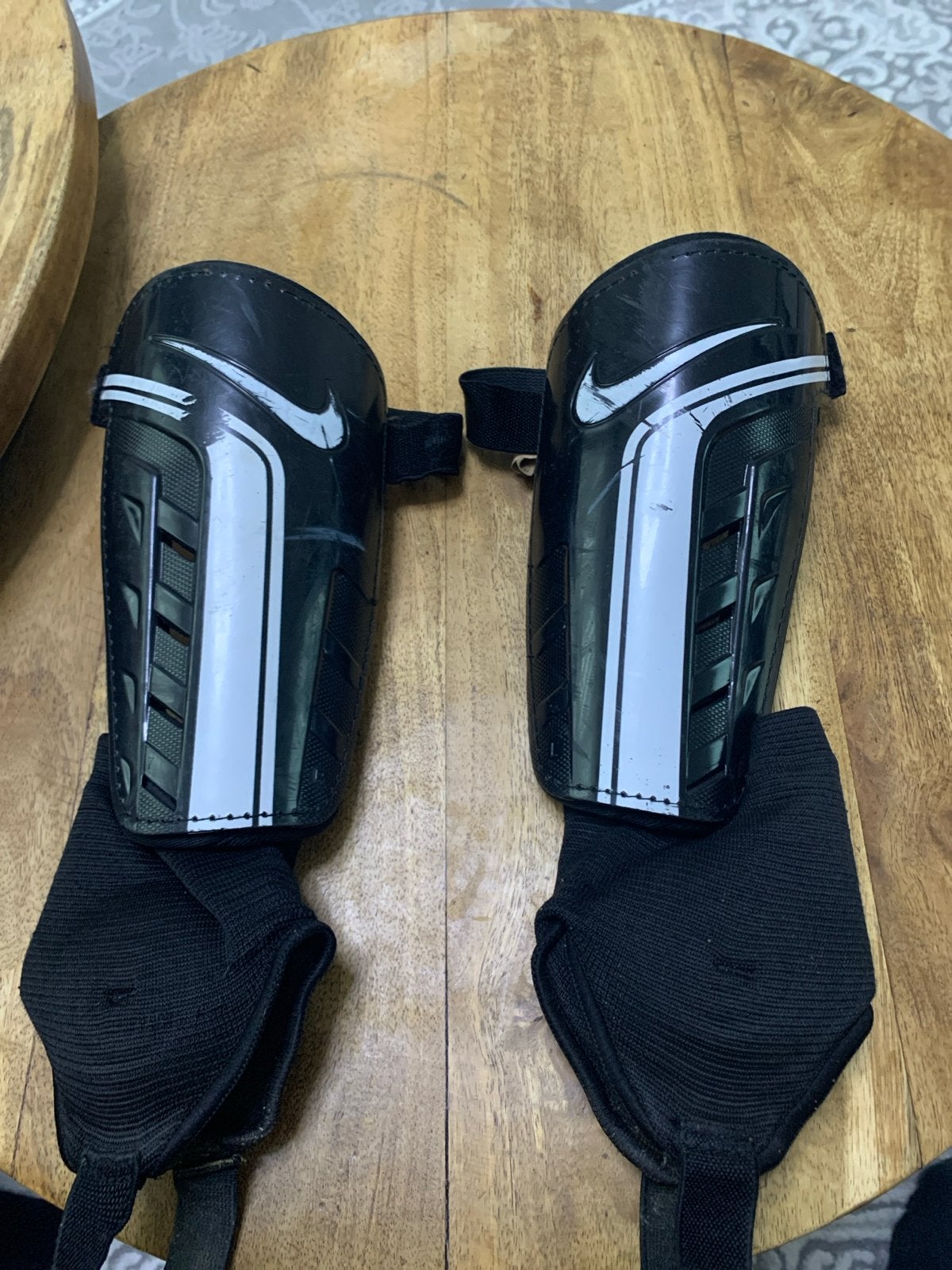 Nike scheenbeschermers - Zo goed als nieuw, Ophalen, Zo goed als nieuw, Overige typen