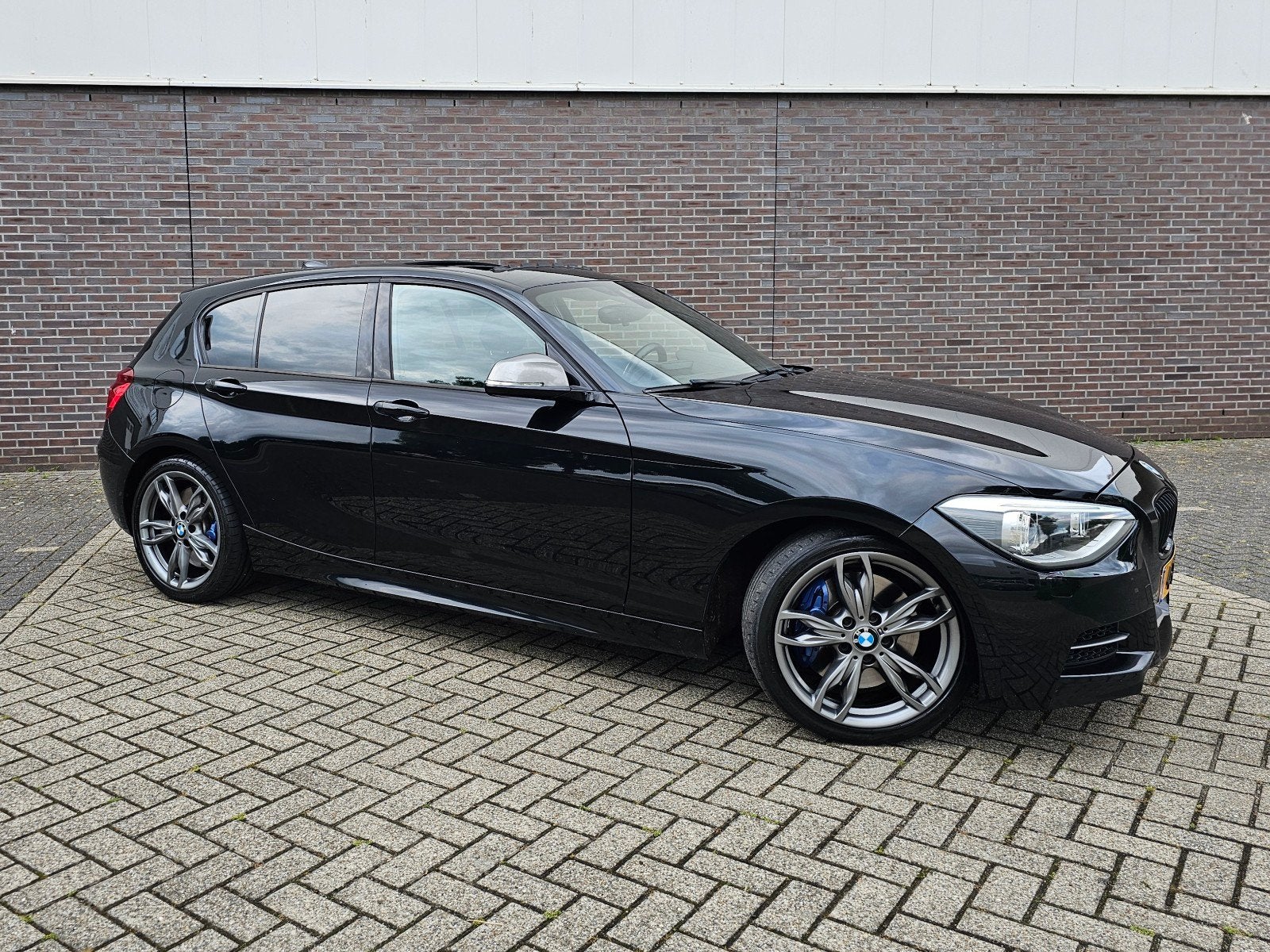 BMW M135i xDrive | AC Schnitzer Perf. Upgrade | NAP, Zwart, Vierwielaandrijving, Particulier, 380 pk