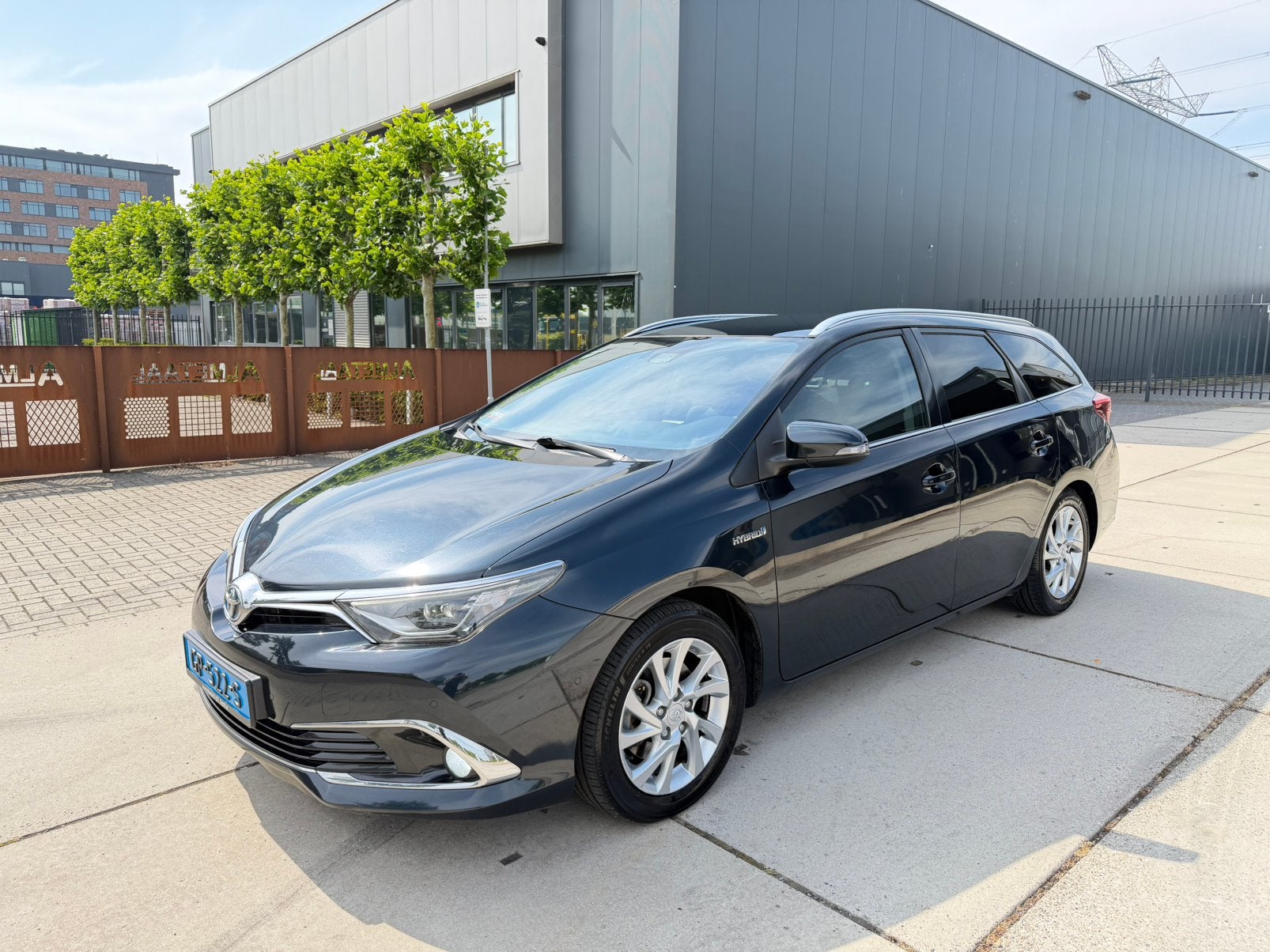 Toyota Auris 1.8 Touring Sports Led Navi Pano NAP 2015, Stof, 4 cilinders, Zwart, Stationwagon