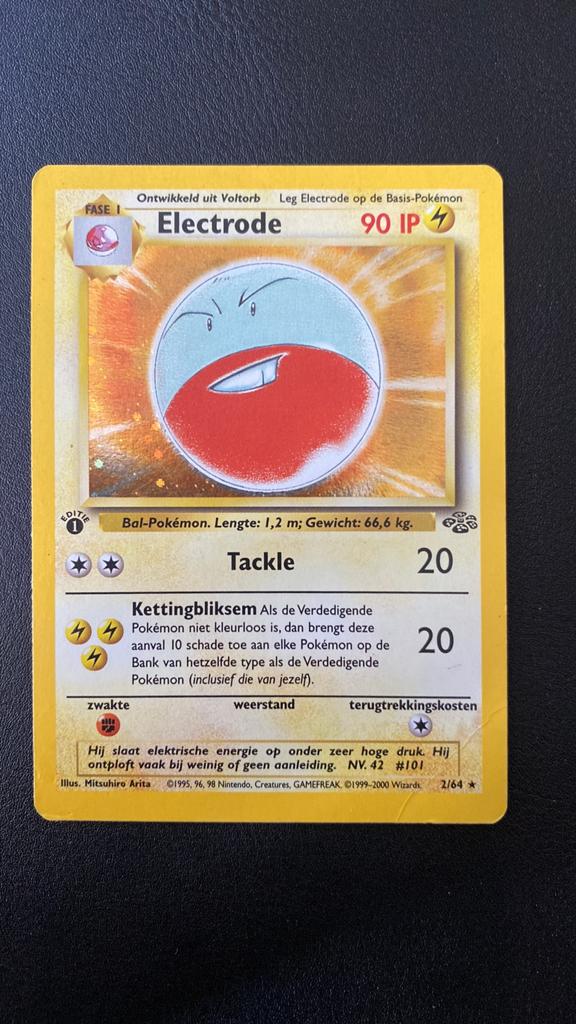 Pokemon electrode 2/64 1st edition holo jungle nederlands, Ophalen of Verzenden, Gebruikt, Losse kaart