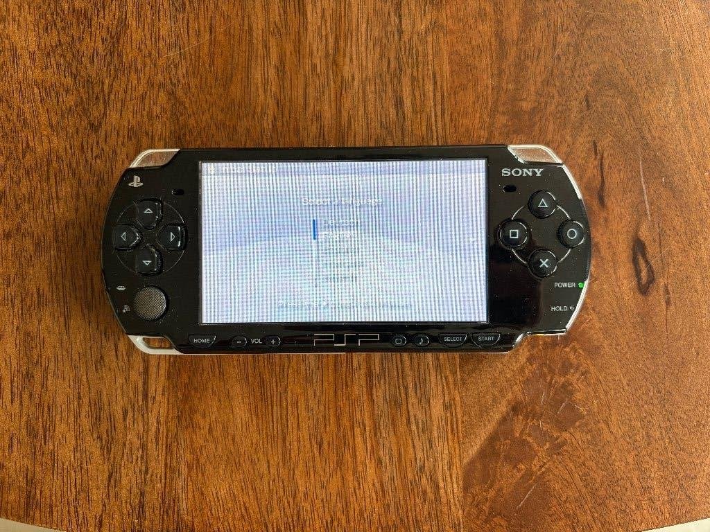 PSP 2000 + games, Spelcomputers en Games, Ophalen of Verzenden, Zo goed als nieuw, PSP Slim, Met games