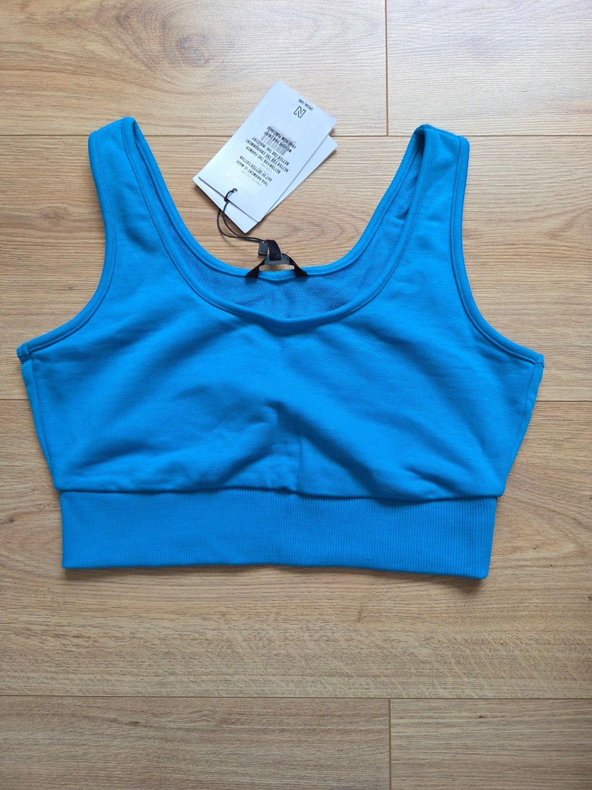 Top Nikkie, maat 42. Nooit gedragen, Blauw, Maat 42/44 (L), Nieuw, Ophalen of Verzenden