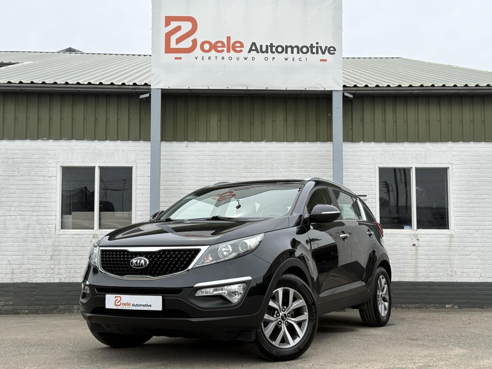 Kia Sportage 1.6 GDI/ Dealer OH / Facelift / Orig NL / Trekh, Auto's, Voorwielaandrijving, Euro 5, 4 cilinders, Zwart