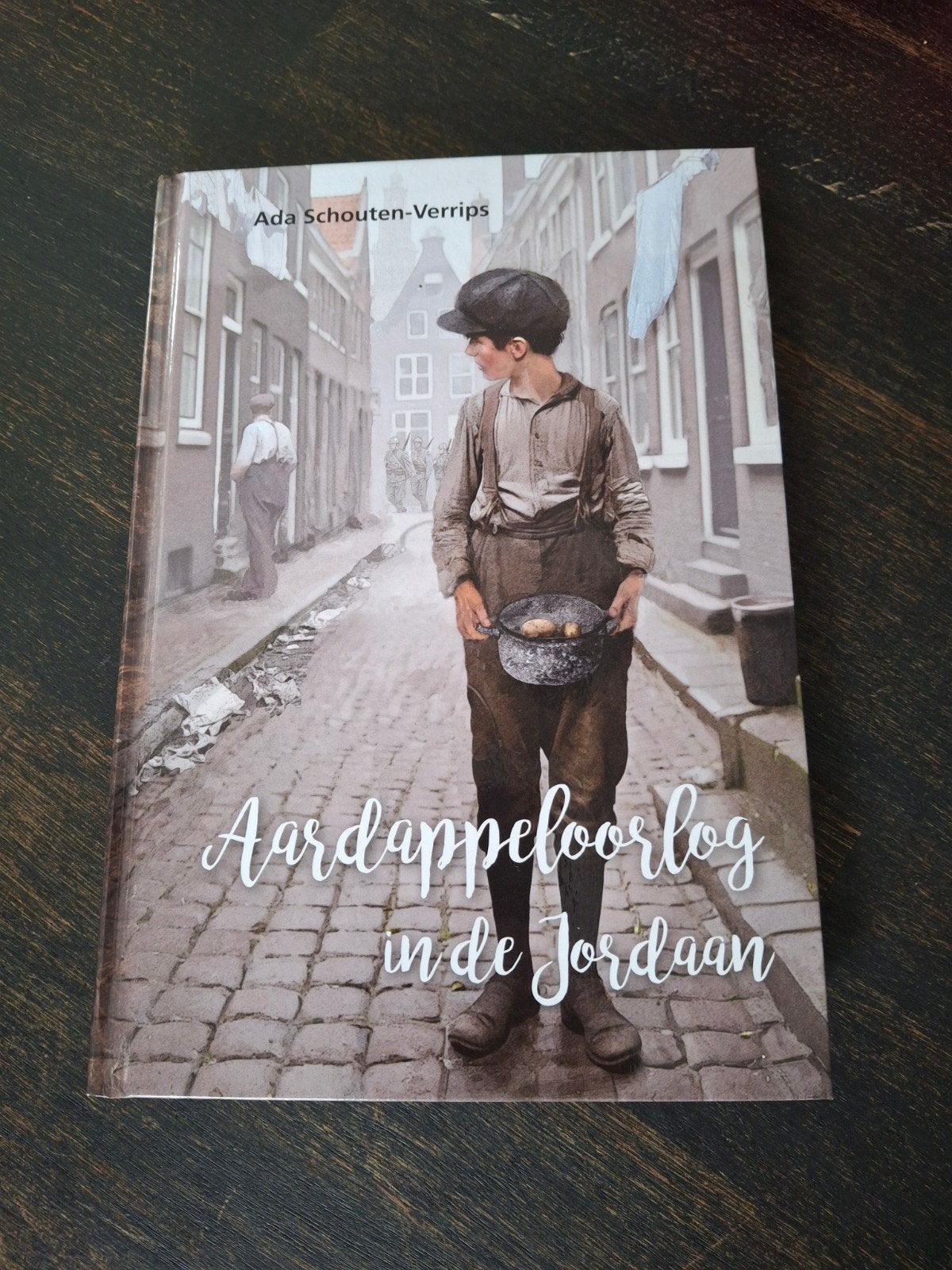 A. Schouten-Verrips - Aardappeloorlog in de Jordaan, Ophalen of Verzenden, Zo goed als nieuw, A. Schouten-Verrips