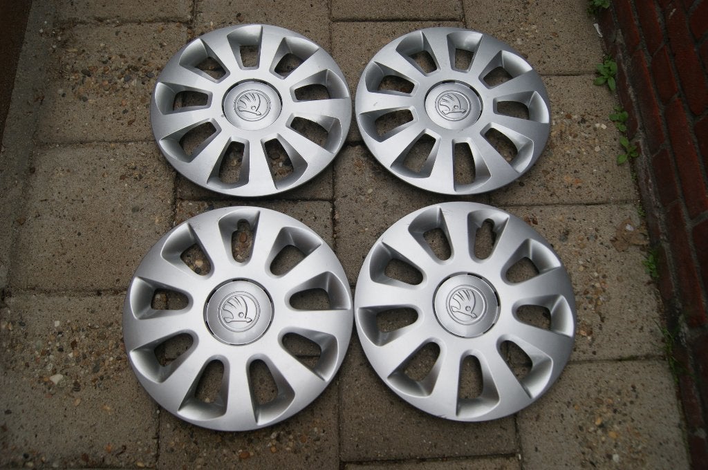 Set van 4 originele wieldoppen Skoda Citigo 14 inch, Auto diversen, Wieldoppen, Ophalen of Verzenden, Gebruikt