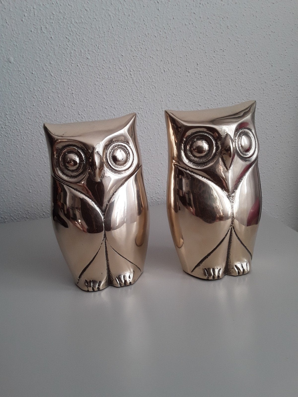 2 messing uiltjes, Ophalen