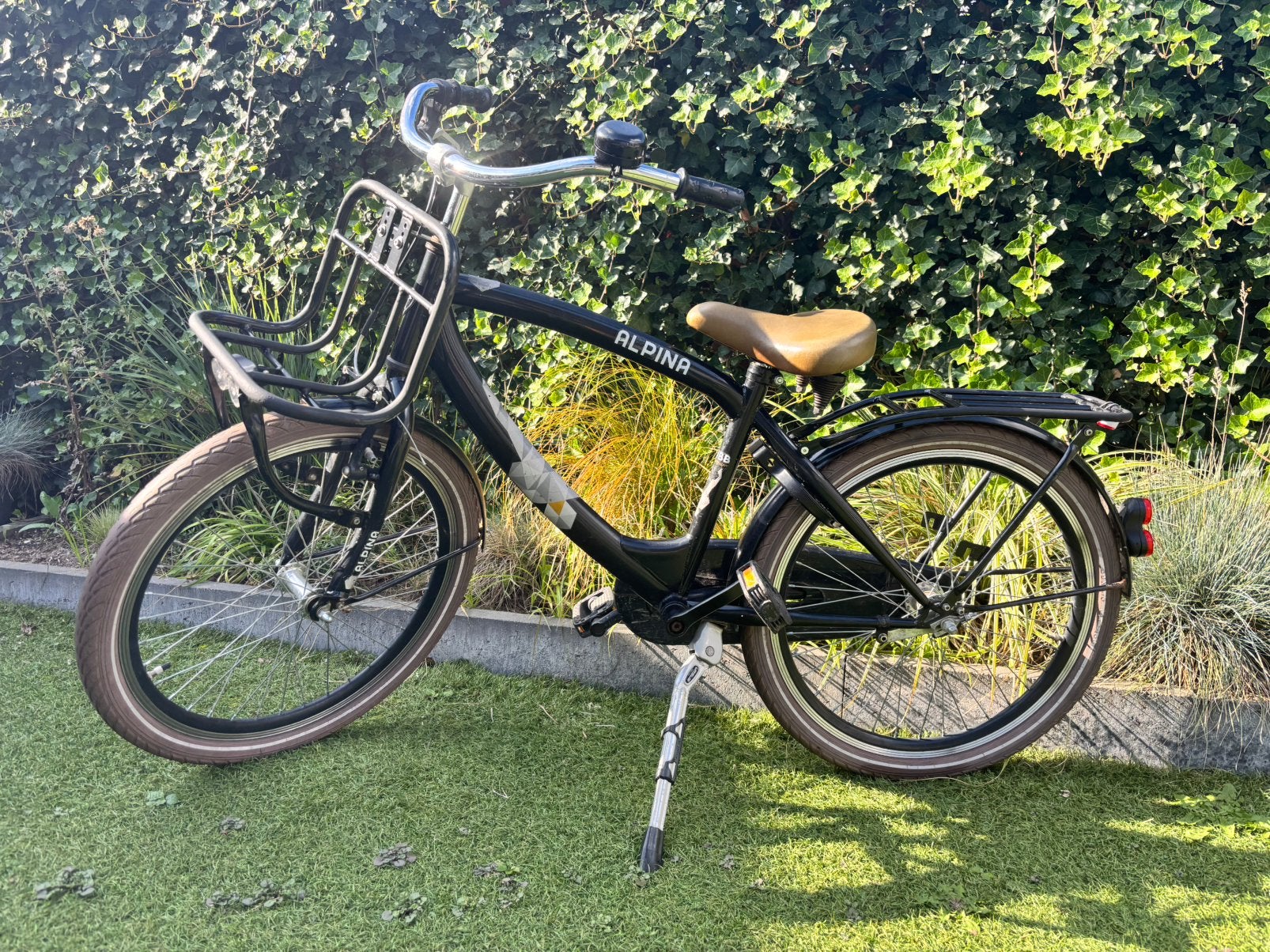Alpina jongensfiets 22inch, Fietsen en Brommers, Ophalen, Terugtraprem, 22 inch, Gebruikt
