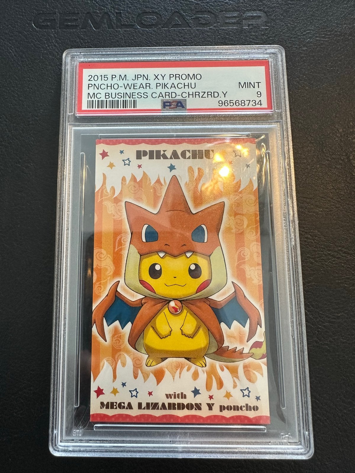 Pikachu Charizard Y Poncho Business Card PSA 9 Mint, Ophalen of Verzenden, Zo goed als nieuw, Losse kaart