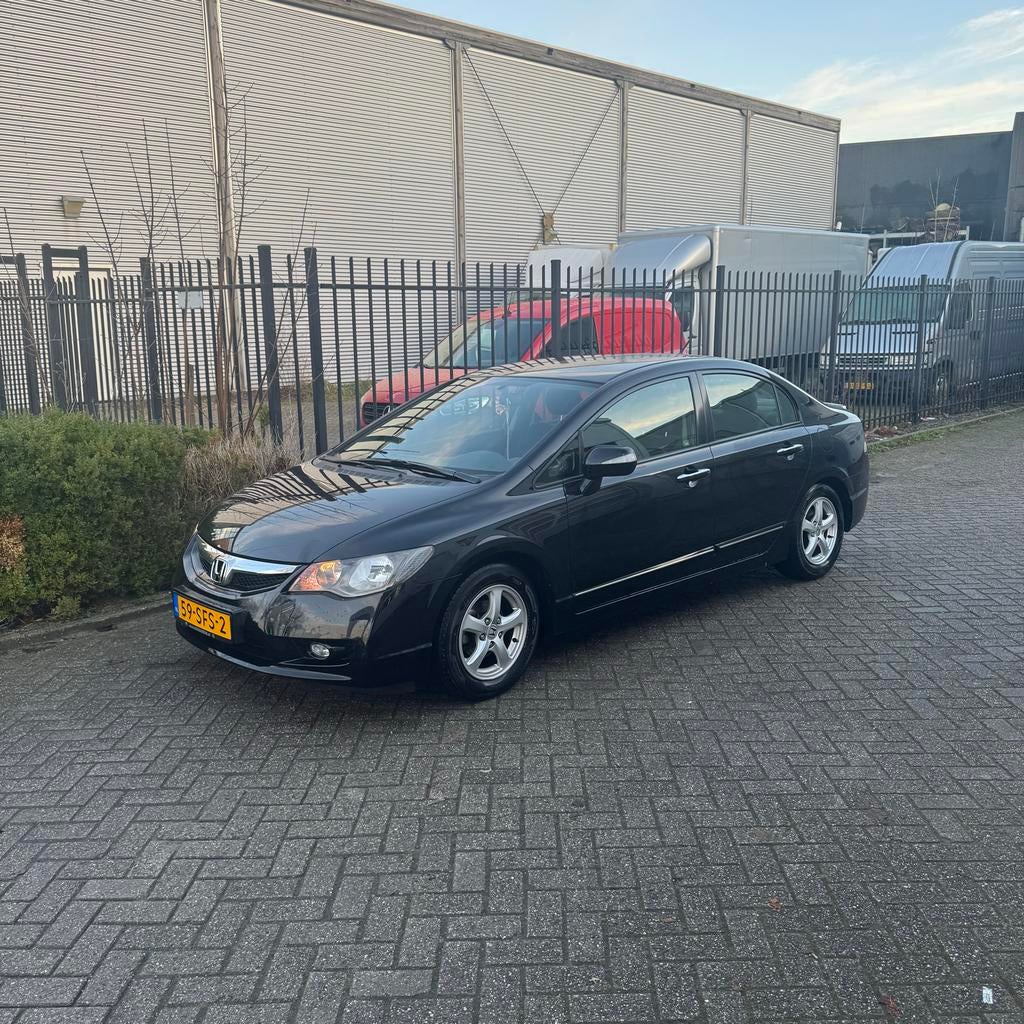 Honda Civic 1.3 Vtec Hybrid 4DR C-tr. 2011 Zwart, Auto's, Stoelverwarming, Stof, 750 kg, Zwart