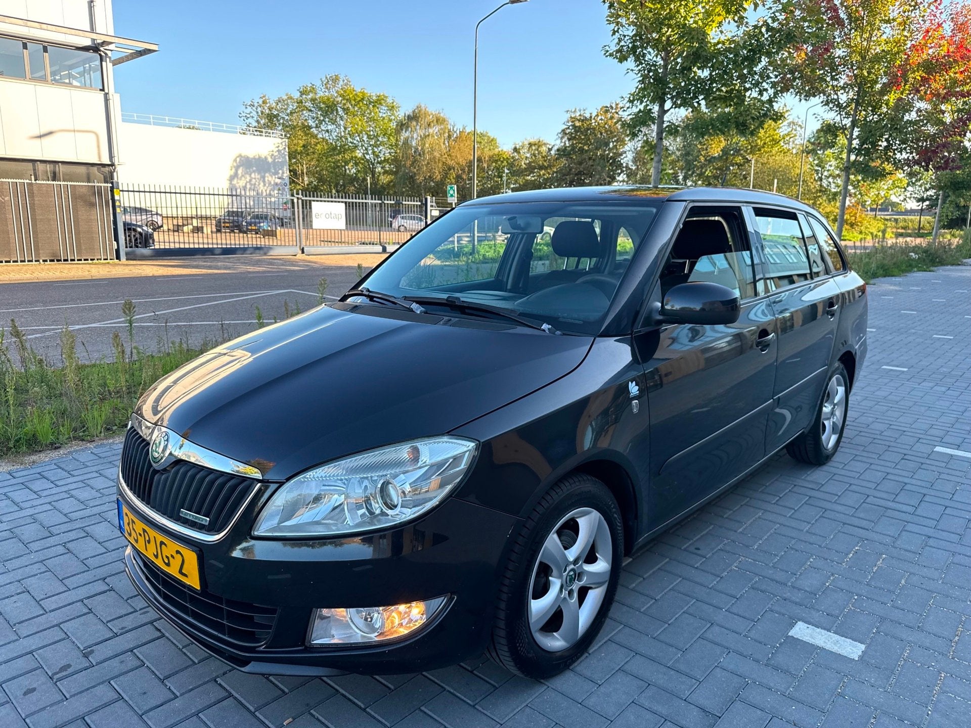 Skoda Fabia Combi 1.2 TDI Greenline (bj 2011) Airco/Cruise c, Auto's, Voorwielaandrijving, Euro 5, 1199 cc, Zwart