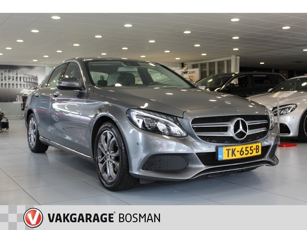 Mercedes-Benz C-Klasse 180 Bus. Sol. AMG/PANORAMADAK/CRUISE/, Auto's, Dealer onderhouden, 4 cilinders, 157 pk, Leder en Stof