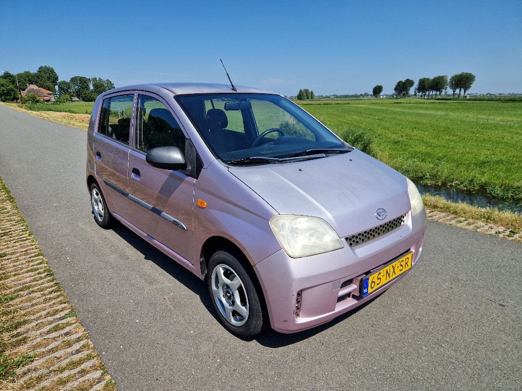 Daihatsu Cuore 1.0 i 5 Deurs Roze Nieuwe APK Weinig KMtrs!, Euro 5, Stof, 600 kg, Cuore
