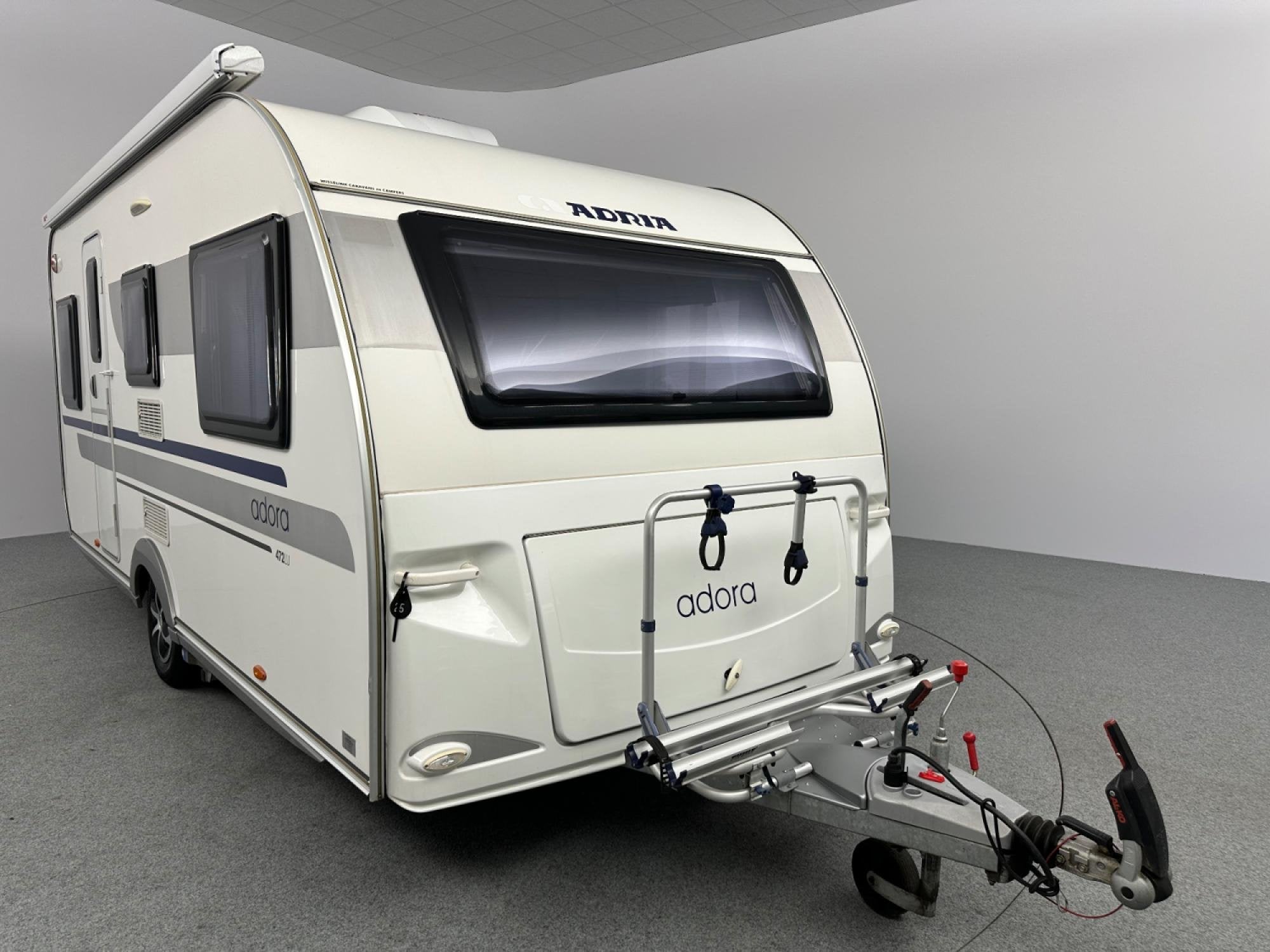 Adria Adora 472 LU Dakairco Cassetteluifel Enkele bedden, Caravans en Kamperen, Hordeur, Rondzit, Bedrijf, Adria