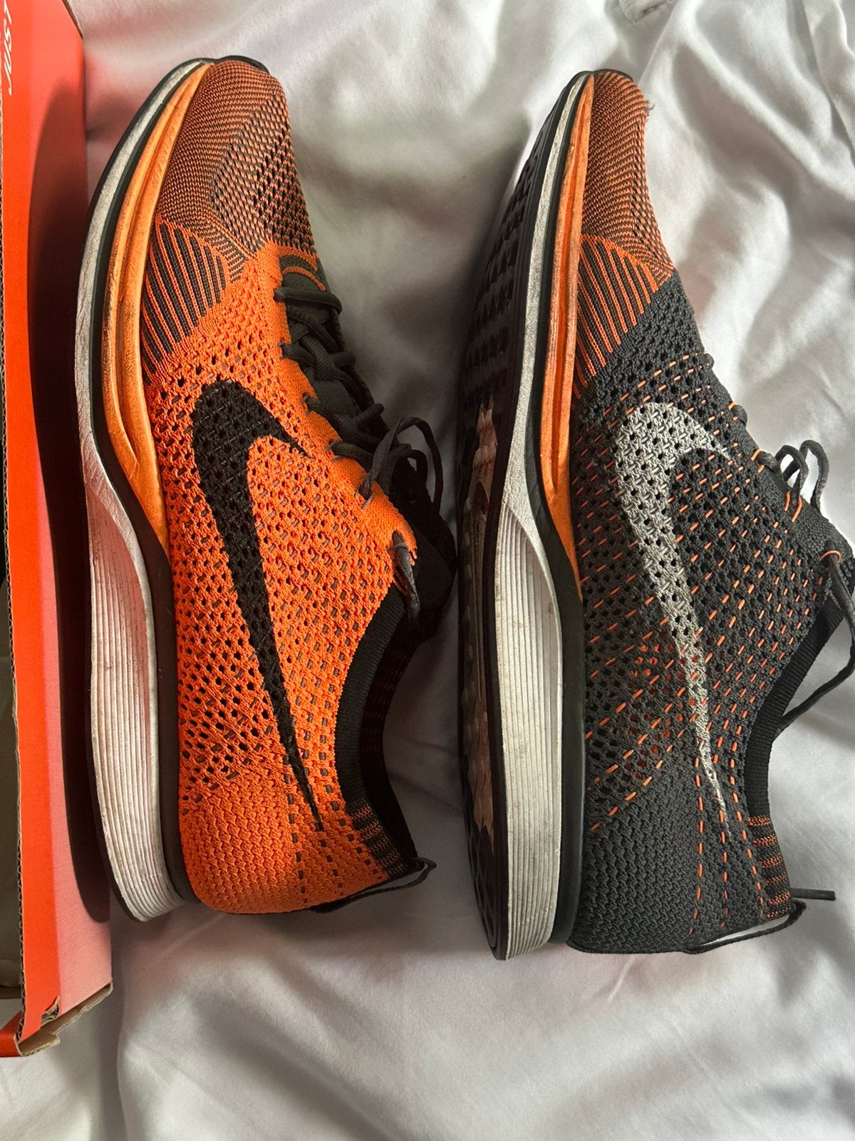 Nike flyknit racer mast 43 oranje/ zwsrt, Ophalen of Verzenden, Zo goed als nieuw, Hardlopen, Hardloopschoenen