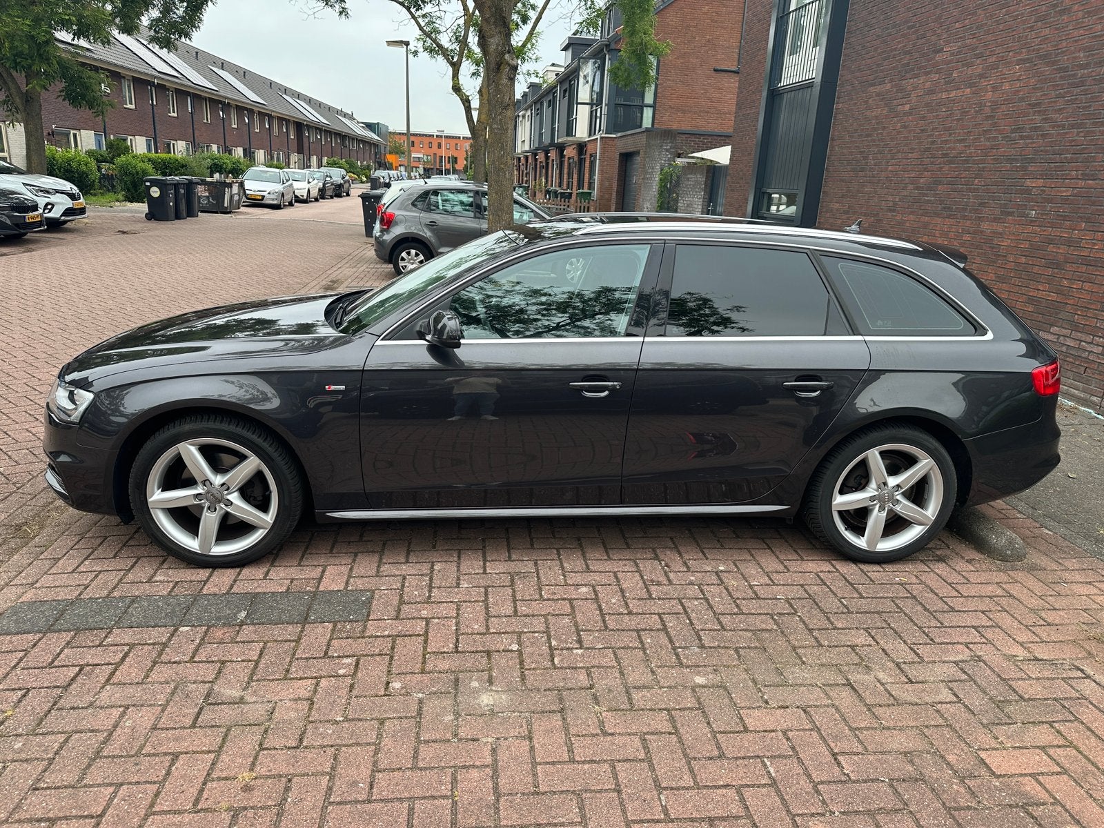 Audi A4 Avant 1.8 Tfsi 125Kw (170PK)  2015 Grijs, Auto's, Stof, Zwart, 4 cilinders, 1505 kg