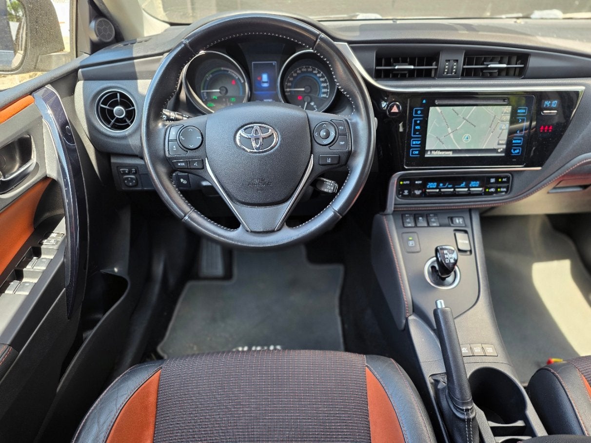 Toyota Auris Touring Sports 1.8 Hybrid Executive, 28 km/l, Gebruikt, Zwart, Leder en Stof