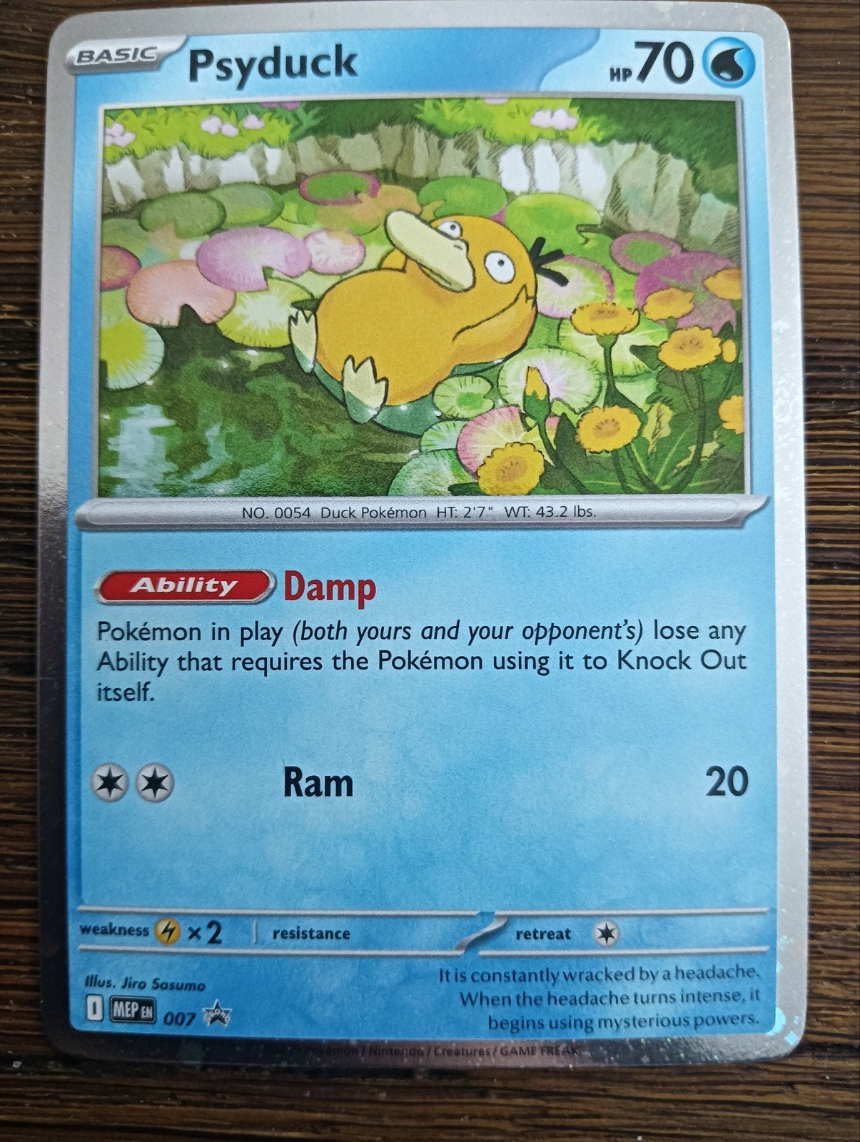 PROMO Psyduck holo  007 Near Mint, Hobby en Vrije tijd, Verzamelkaartspellen | Pokémon, Ophalen of Verzenden, Zo goed als nieuw