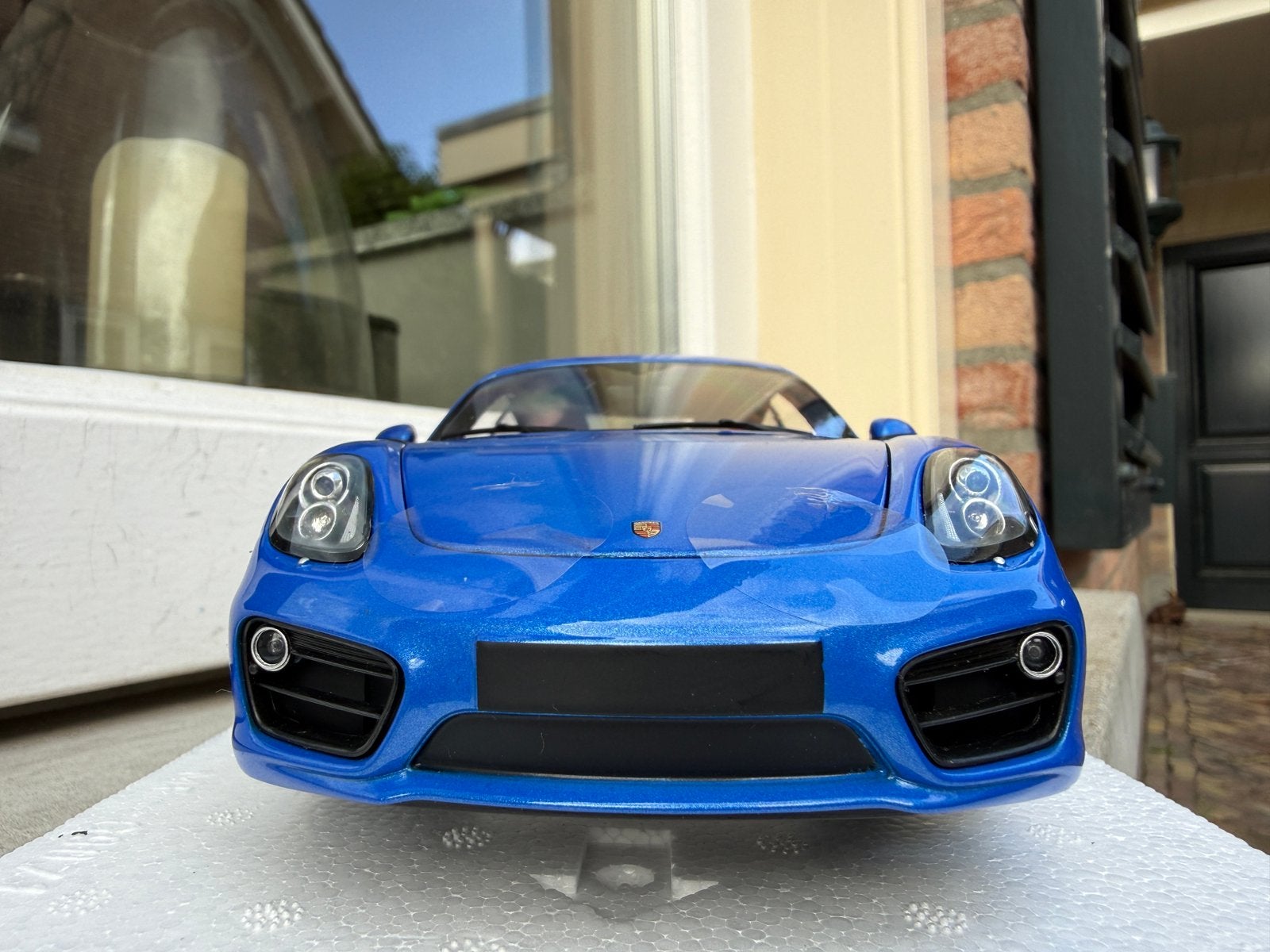 1:18 Porsche 981 Cayman blauw 2013 Minichamps, Hobby en Vrije tijd, Minichamps, Auto, Nieuw, Ophalen of Verzenden