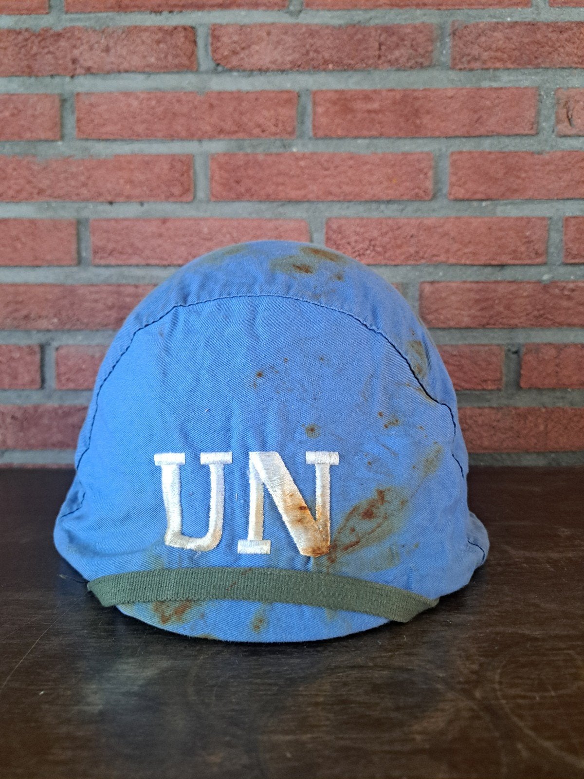 UN helmhoes - Origineel en gebruikt, Ophalen of Verzenden, Overige soorten, Overige gebieden, Helm of Baret