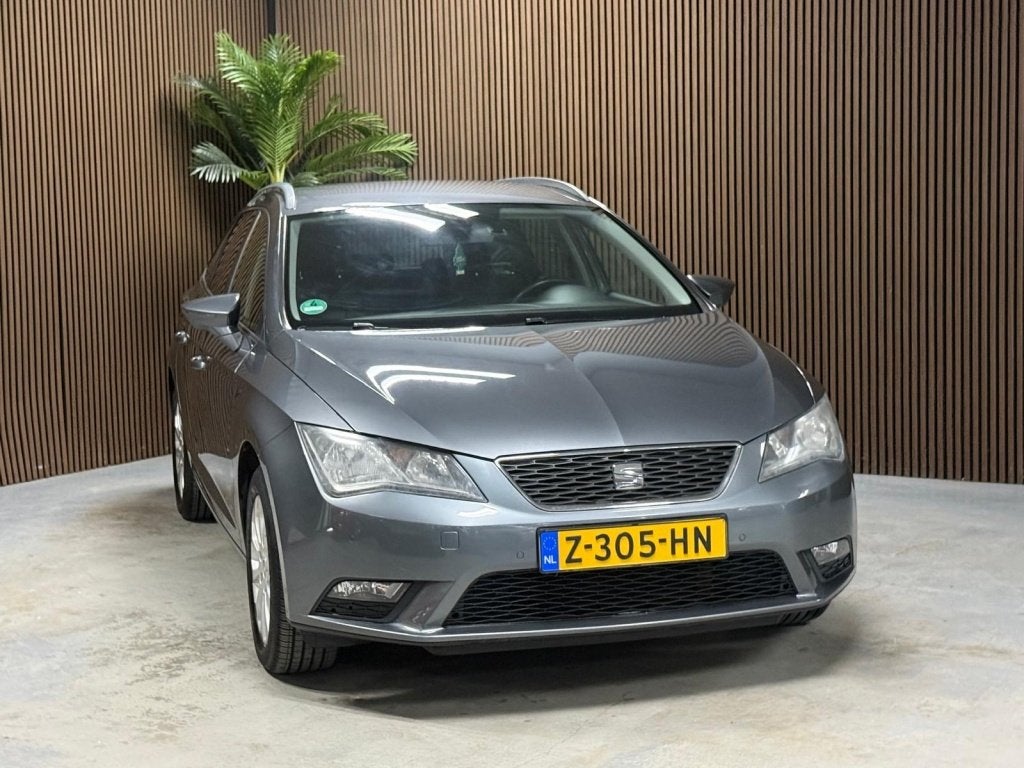 SEAT Leon ST 1.2 TSI St. First Ed (bj 2014, automaat), Auto's, Euro 5, Gebruikt, 4 cilinders, Leon