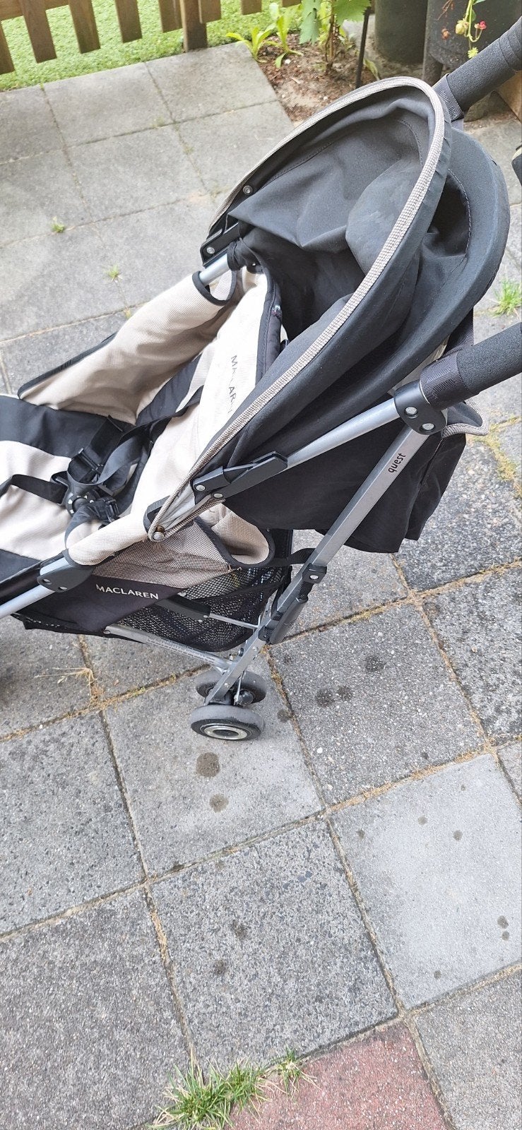 Maclaren buggy met regenhoes, Ophalen