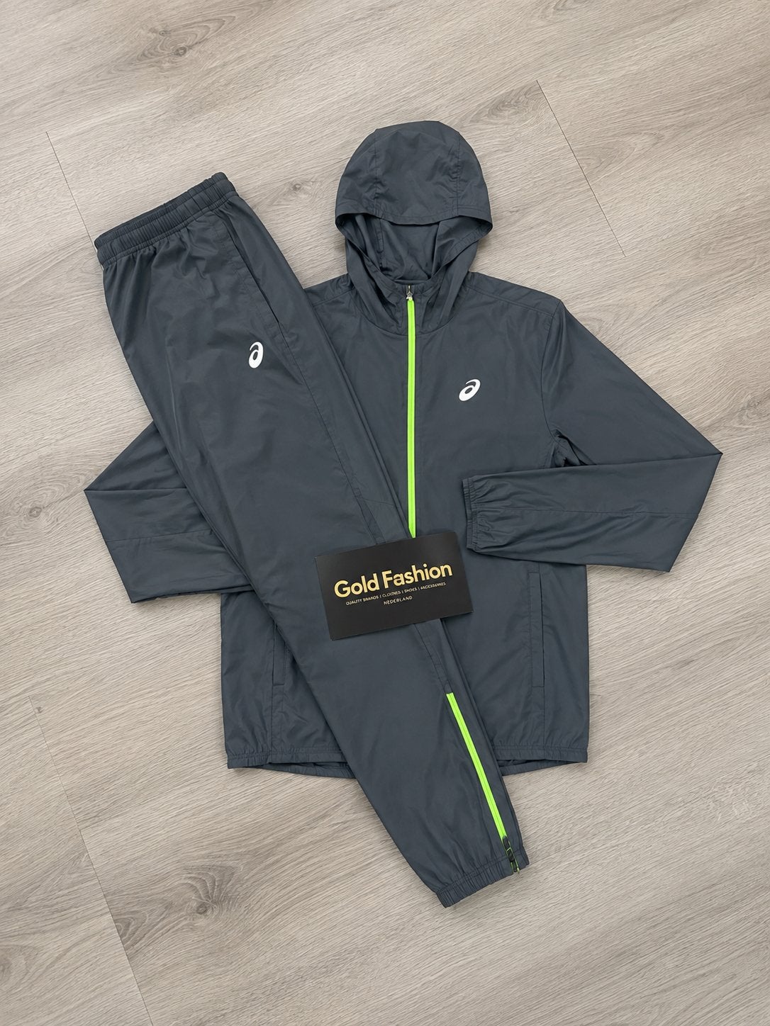 ASICS Trainingspak | Nieuw | S t/m XL | Op Voorraad, Ophalen of Verzenden, Nieuw, Overige maten, Algemeen