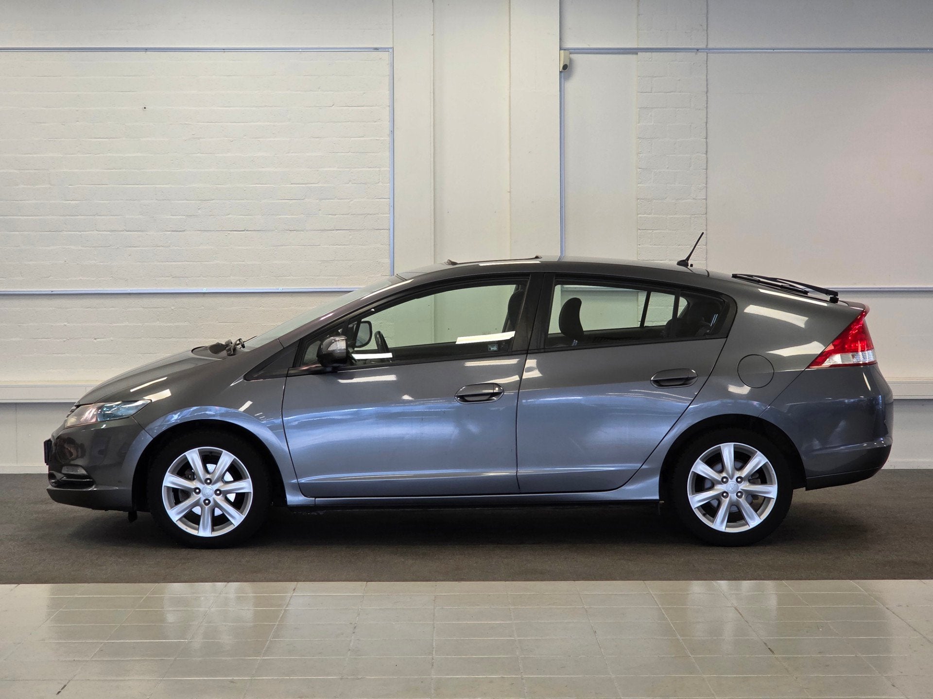 Honda Insight 1.3i Business Mode Schuif/kanteldak Navi PDC, Auto's, Euro 5, Stof, Gebruikt, Zwart
