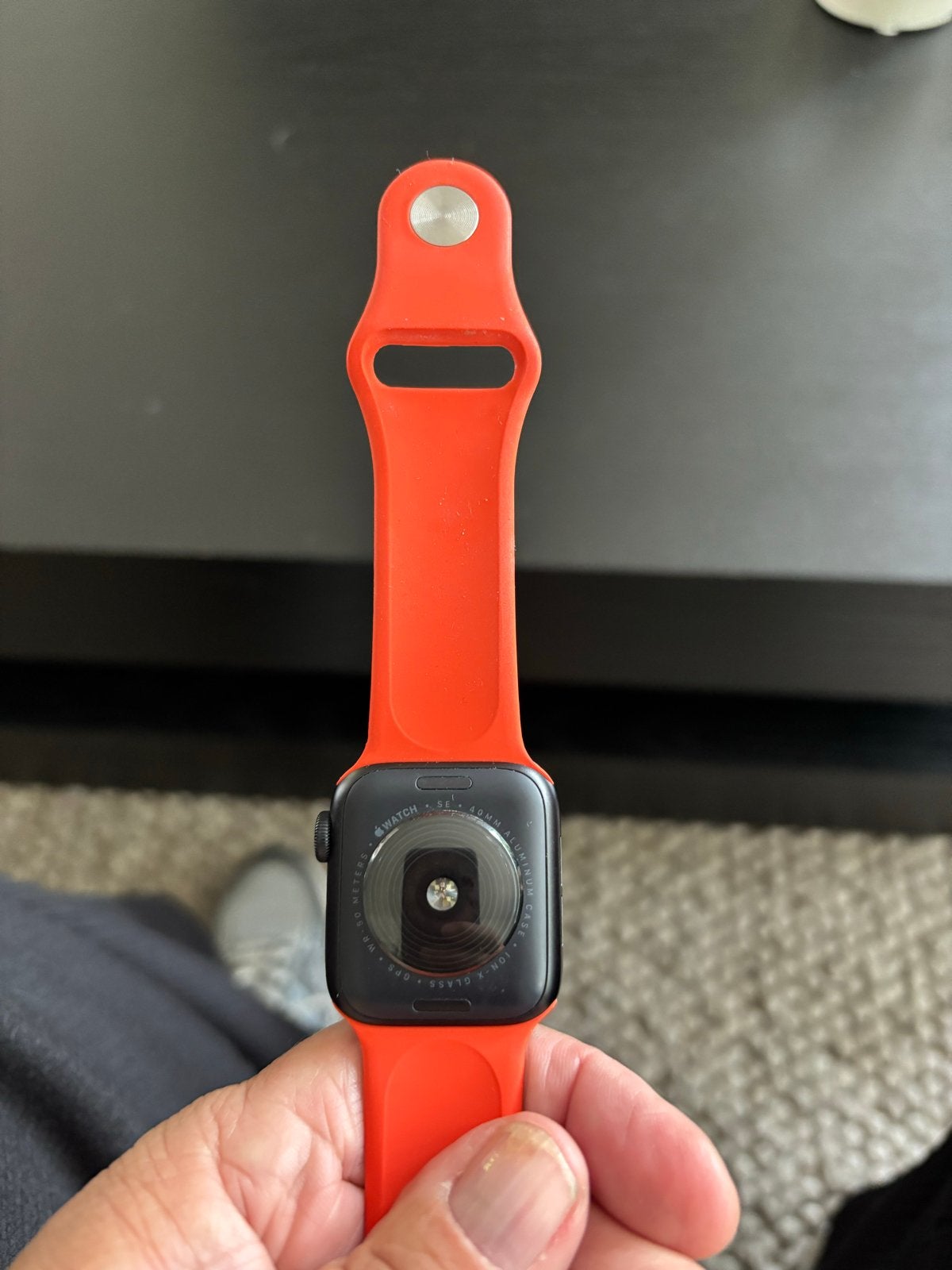 Apple Watch SE 2025 met oranje en zwart bandje, Ophalen of Verzenden, Zo goed als nieuw, Zwart, IOS