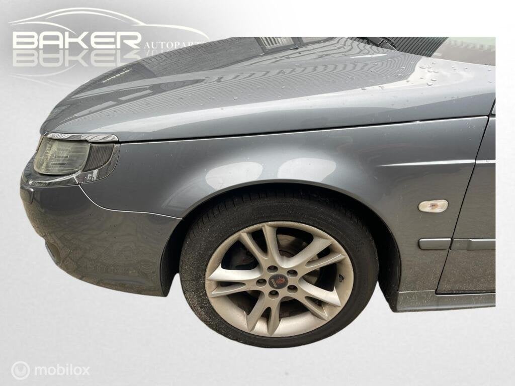 Linker spatbord links grijs 303 Saab 9-5 ('05-'09), Auto-onderdelen, Carrosserie en Plaatwerk, Gebruikt, Ophalen of Verzenden