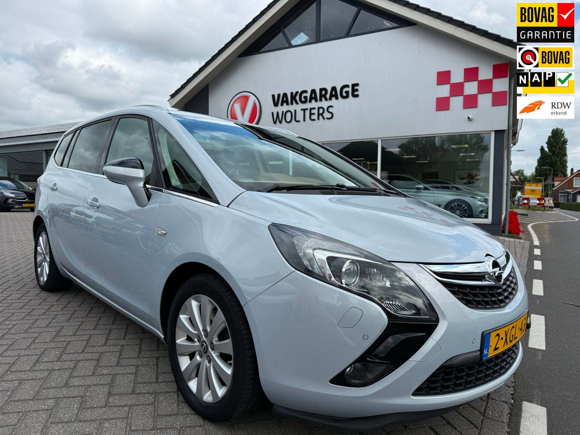 Opel Zafira Tourer 1.4 Cosmo 7p. RIJKLAARPRIJS!, Auto's, Opel, Euro 5, Stof, Gebruikt, Zwart