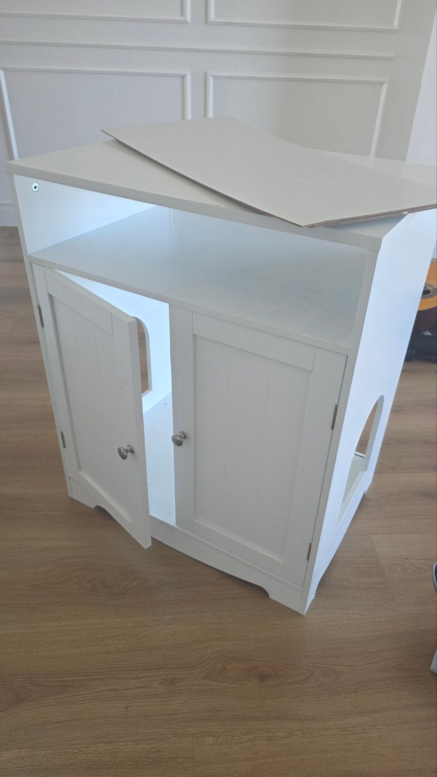kattenbak kast, Ophalen